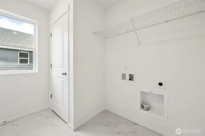 Laundry room upstairs for convenience. Laundry room upstairs for convenience.