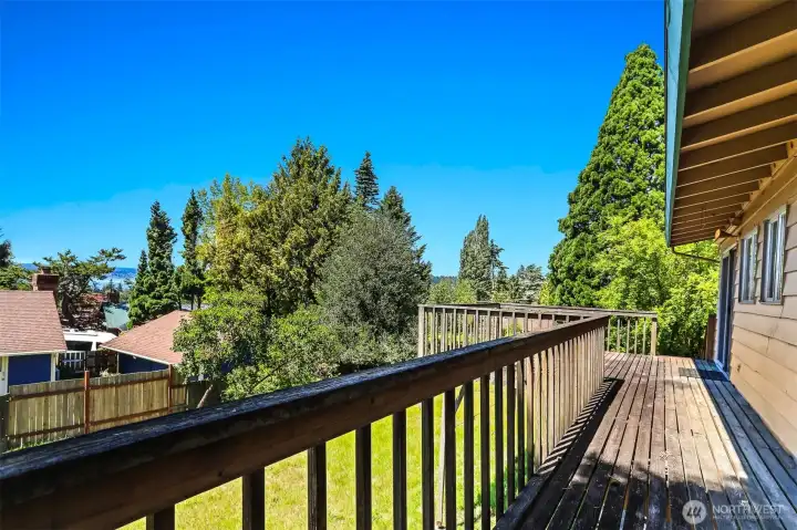 Deck off the primary bedroom. Enjoy the morning view.