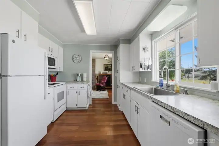 A view of the kitchen, you can see off to your left you have an entrance into the living room. The window above the sink has a great view to the back yard. A view of the kitchen, you can see off to your left you have an entrance into the living room. The window above the sink has a great view to the back yard.