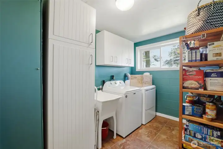 A view of the laundry area. Large enough to add shelving to store extra things. A view of the laundry area. Large enough to add shelving to store extra things.