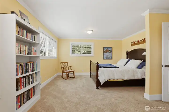 This is the primary bedroom located upstairs. This is the primary bedroom located upstairs.