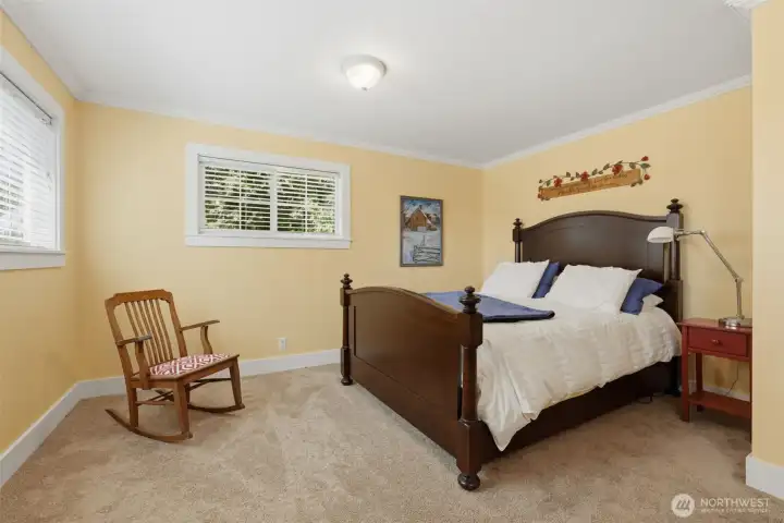 Another view of the upstairs primary bedroom. Another view of the upstairs primary bedroom.