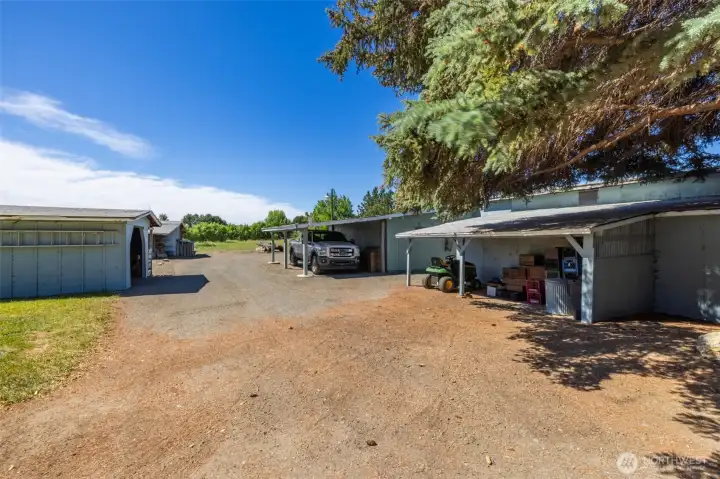 This is a view of the drive way that takes you to all the outbuildings. This is a view of the drive way that takes you to all the outbuildings.