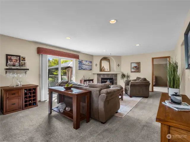 The family room is only steps away from the kitchen and offers access through the sliding glass doors to the back yard and patio.