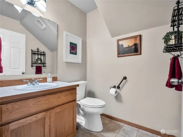 The half bathroom is located near the family room as well.