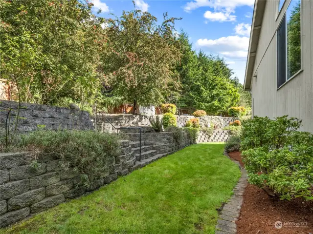 A view of the terraced landscaping that is on the east side of the home.