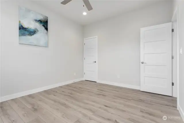 Main quest bedroom has closet and across the hall from half bathroom.