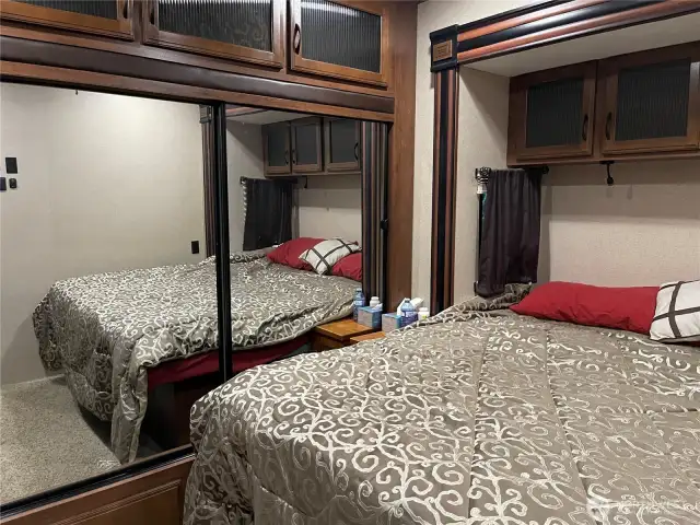 Primary bedroom with lots of storage.