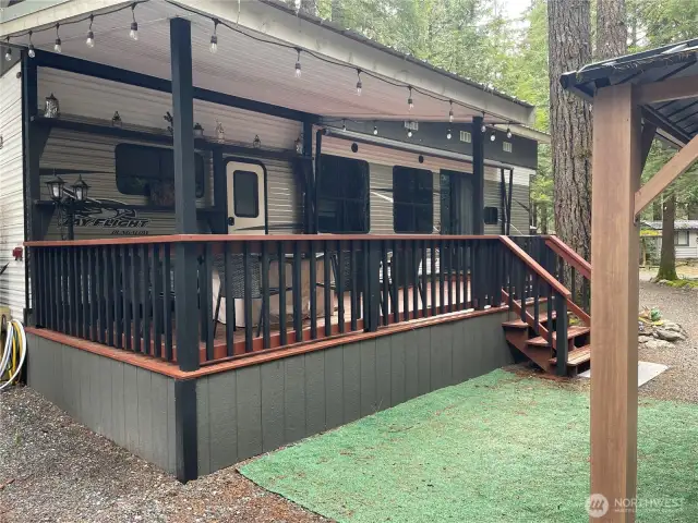 Enjoy the partially covered deck.