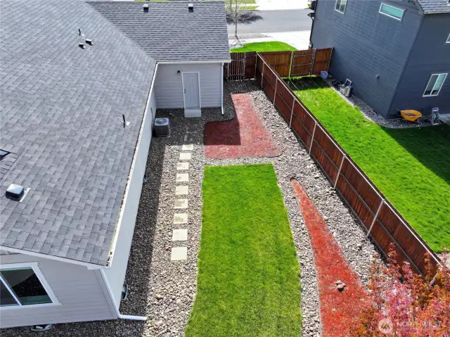Side yard fully landscaped