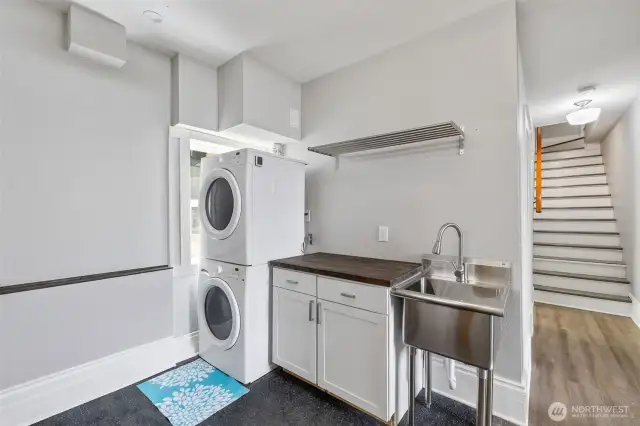 Utility space w/updated cabinets & utilty sink