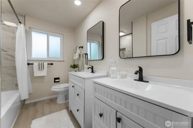Full bath on main floor with double vanity