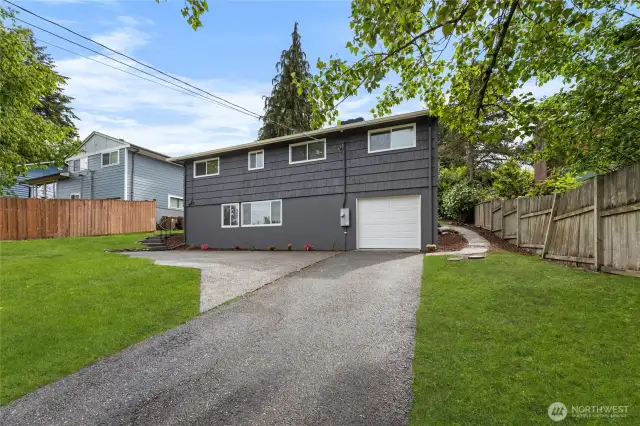Plenty of parking for RV/Boat/Toys & 1 car attached garage