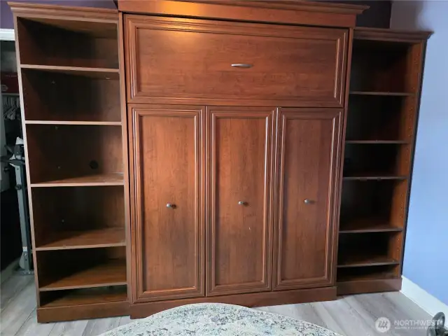 Built in Murphy Bed in second bedroom.  This room is currently being used as a moving box room.