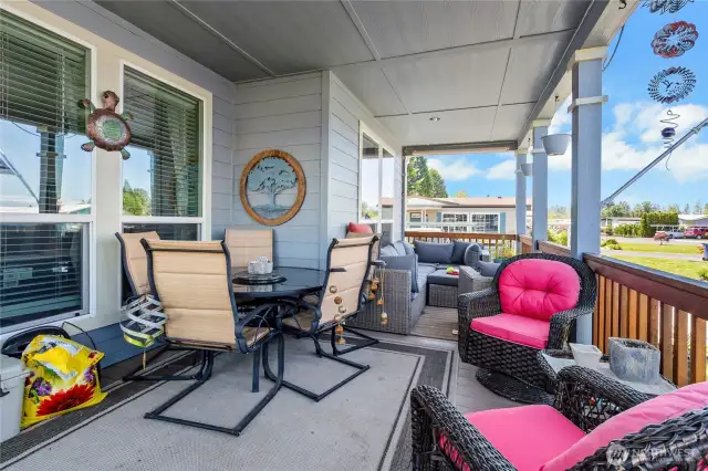 Large covered porch across the full front of the home.