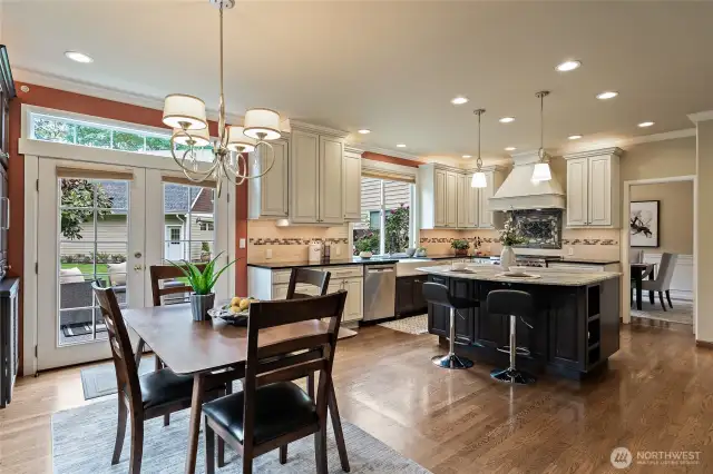 French doors lead from kitchen/dining area to the back patio.