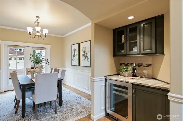 Dry bar with wine refridgerator off the dining room.