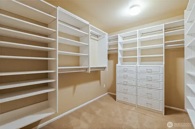 Primary walk-in closet with closet system!