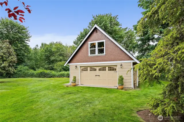 The detached, 875 sqft shop built to match the house and is the perfect addition to the 3 car attached garage!