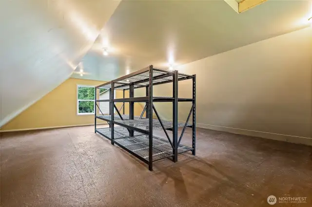 560 SF of storage above the shop.