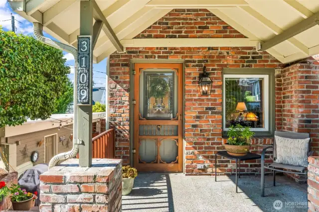 Your covered front porch, complete with vintage screen door and creeping vines, is the perfect spot to sit in the shade and watch the world go by.