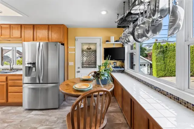 Eat-in kitchen nook with lots of cabinet space.
