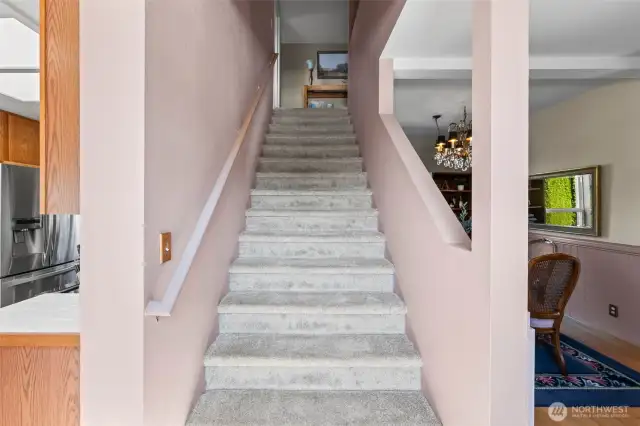 Head down to the main level-Notice the wide staircase, which is rare in the North End.