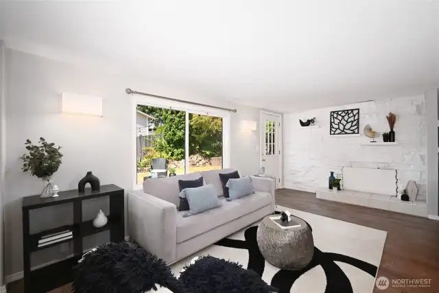 Gorgeous light-filled living area offers great entertaining potential. Picture windows allow maximum sunlight.