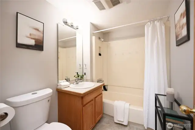 Updated full bath off of living area.