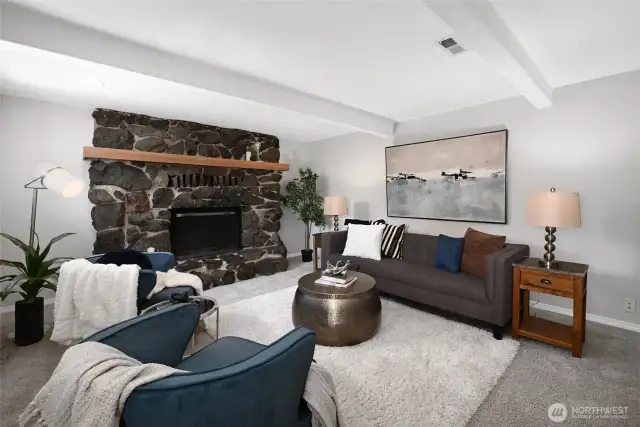 Sizeable bonus room with wood burning fireplace.
