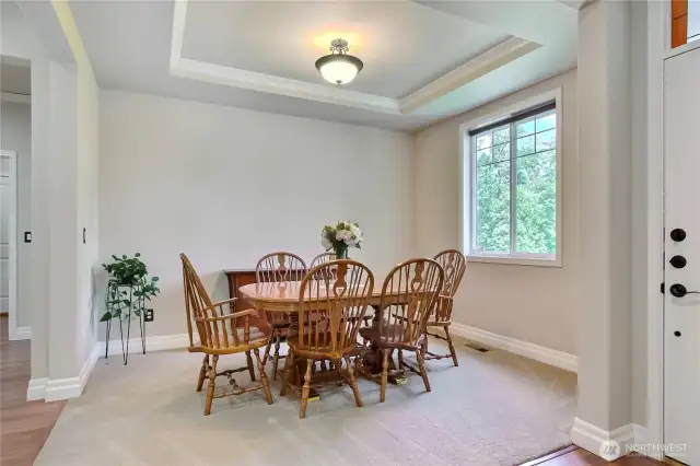 Elegant dining room with coved ceiling.