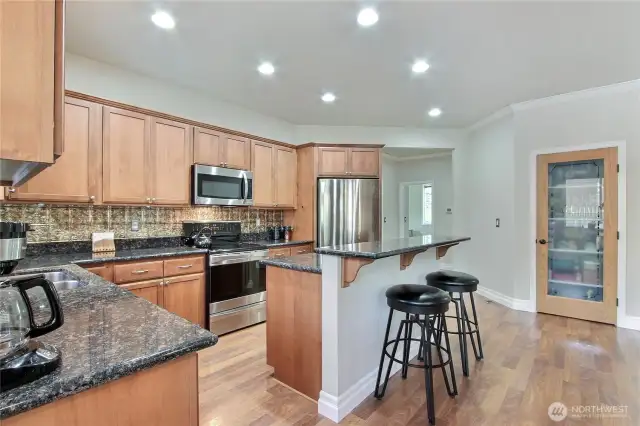 Full granite breakfast bar.  Bar stools can stay.