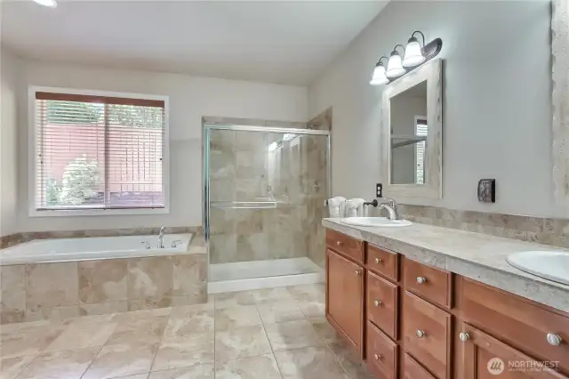 Large 5-piece primary bath with double vanities.