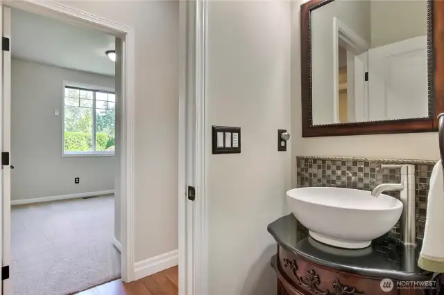 Half bath off the main hallway.