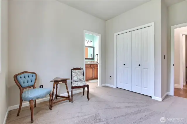 One of two extra bedrooms with a conjoining full bathroom.