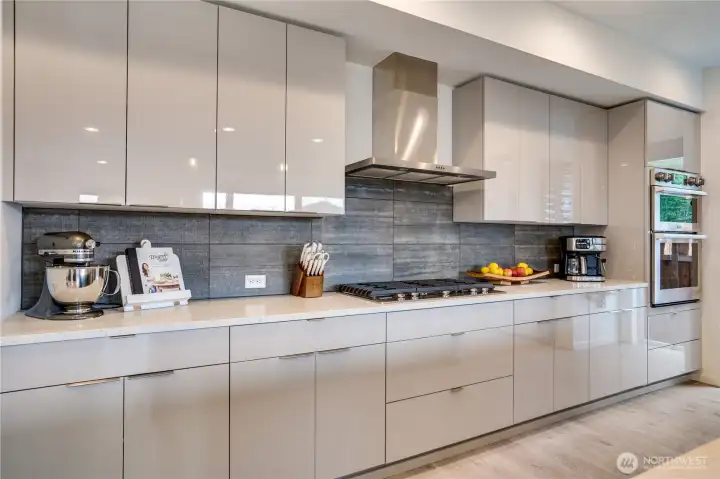Modern tile backsplash-sleek geometric pattern in matte charcoal, it pops like a gallery piece.