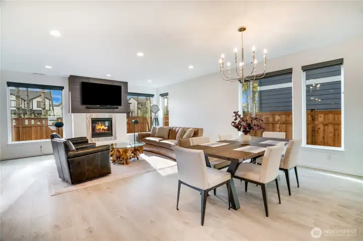 Natural light pours in from wall of windows, Garber custom blinds add privacy.