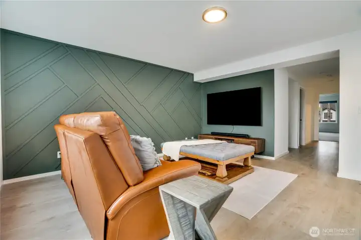 Upstairs hardwood flooring flows seamlessly throughout.