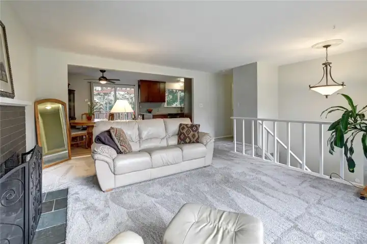 Upper level living room w/ new carpet & paint.