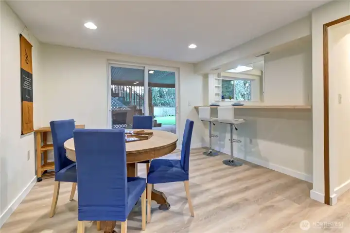 Private lower-level ADU rear entrance off dining room + back yard patio.