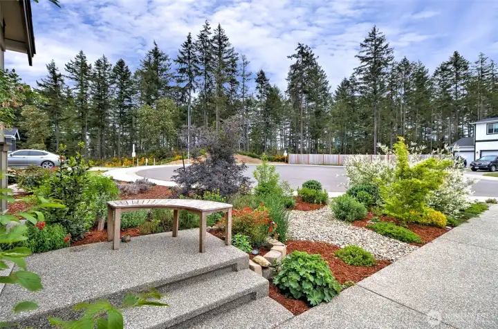 Beautifully upgraded, low maintenance landscaping.. no watering required!