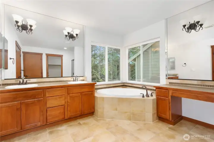 5-piece primary en suite with oil-rubbed bronze fixtures and sit-down vanity