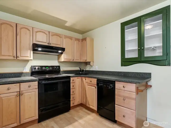 Downstairs full kitchen. Full size fridge to the right. Downstairs full kitchen. Full size fridge to the right.