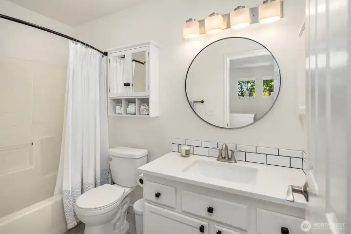 The two secondary bedrooms share this full hallway bath. The two secondary bedrooms share this full hallway bath.