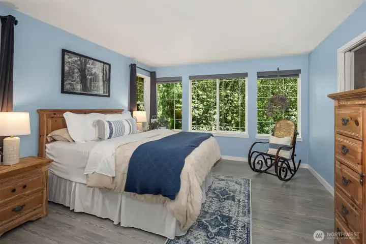 You'll understand when you see this in person, but the primary bedroom feels like you are in a tree house in the best of ways. You'll understand when you see this in person, but the primary bedroom feels like you are in a tree house in the best of ways.
