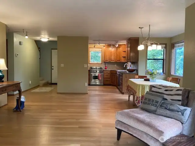 Looking from the free standing gas burning stove to the kitchen.