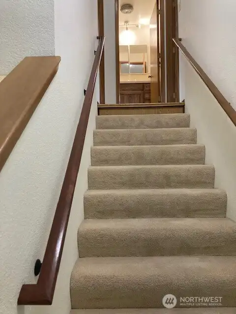 Slip off your shoes and come enjoy the 2 bedrooms upstairs.