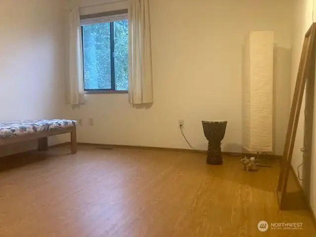 Drum room with a closet and a large room for storage.
