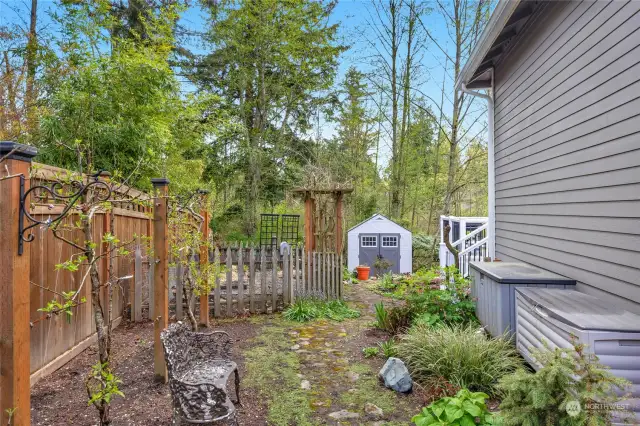 One side of the home shows the magical pathway that lead to a great vegetable garden area.