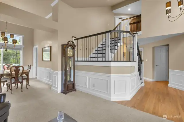 Hardwood floors in the entry and dramatic hardwood staircase leading to the second floor.  Formal living room and formal dining rooms located on main floor just off entry to home.